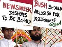Raza Academy, a Muslim organization, protest the alleged desecration of the Qur'an at the U.S. detention centre in Guantanamo Bay, Cuba, in Bombay, India, Monday