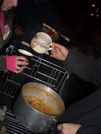 grassroots support - food not bombs give out soup