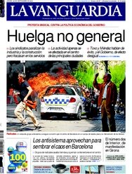 Spains papers front page shows fotos of CITY IN FLAMES