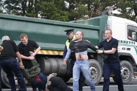 Dublin MEP Paul Murphy being dragged away