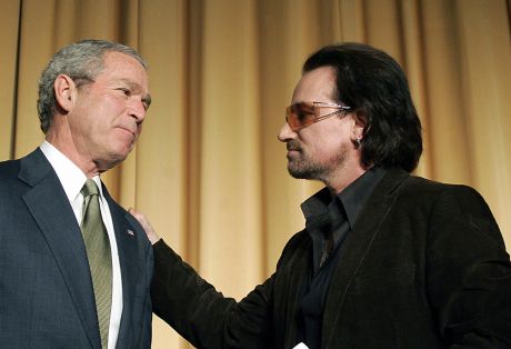 Bono and fellow "Christian" Bush
