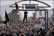 A Capitalist doll was hung at a recent protest in Iceland