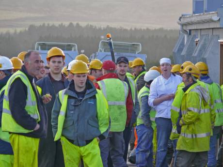 Site workers : bemused, shaken but not stirred to join us despite earnest exhortations 