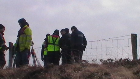 Shell workers talking to the garda