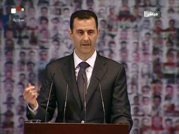 An image grab taken from the state-run Syrian TV shows Syria's embattled President Bashar al-Assad making a public address on the latest developments in the country and the region on January 6, 2013 (AFP Photo)