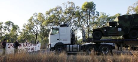 Military vehicles were blocked for over an hour and a half this morning on a major access road to the Talisman Sabre war games exercise area in Shoalwater Bay, QLD