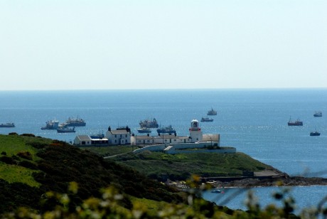 Fishing boats off Roches Point lighthouse, Co. Cork