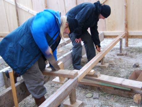 building the joists to support the floor