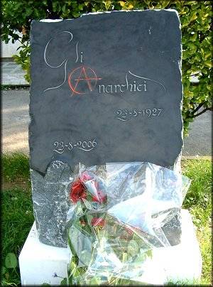 a simple memorial to "the anarchists" on the 79th anniversary of their execution at the square named after them in Milan- Italy.