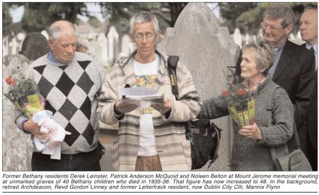 Former Bethany residents Derek Leinster, Patrick Anderson McQuoid and Noleen Belton at Mount Jerome memorial meeting at unmarked graves of 40 Bethany children who died in 1935-36. That figure has now increased to 48. In the background, retired Archdeacon,