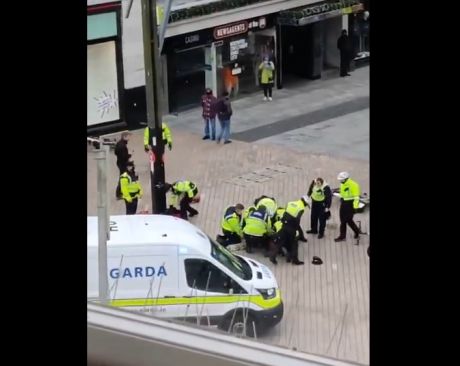 Up to 13 Garda used to arrest Cork street performer Gruby for the crime of street performing. This is the new normal