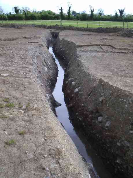 A connecting trench to the large enclosure 