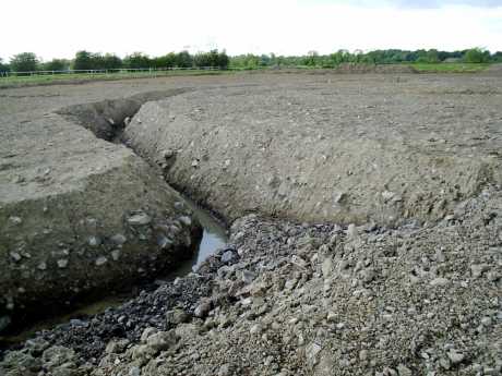 Part of a massive enclosure near Trevit that is under threat today