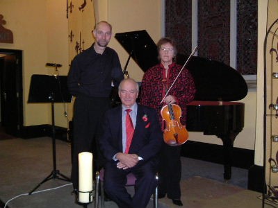 Chris Blake and Ruth Bebb with (seated) Michael Harris-Barke, Chairman of Carlingford Heritage Trust.