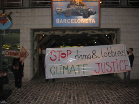 Stop dams and lobbies * climate justice (BCN direct action to climate talks lobby groups)