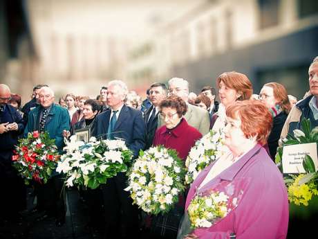 Relatives, Dublin Bus workers, friends and supporters gather to lay wreaths and flowers at the 30th anniversary