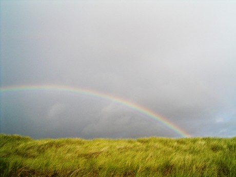 Rainbow above camp ,pots of gold at the end of it but for whom ?