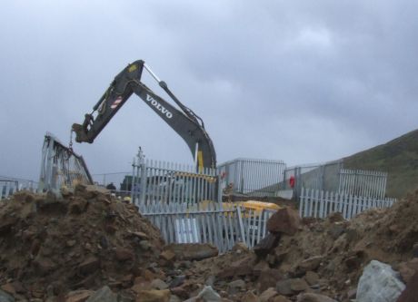 Shell's workers 'tidying up' nature's handiwork - good riddance to those fences!