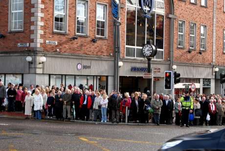 A few hundred more wait to join the march at Mangan's Clock
