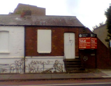 Boarded up cottage along Canal Road, Dublin
