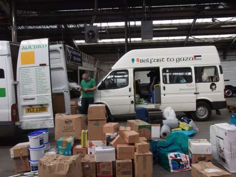 Belfast and Antrim crews loading humanitarian aid